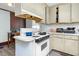 Kitchen with white cabinets and appliances at 1026 Nashville Rd, Rocky Mount, NC 27803