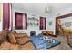 Cozy living room featuring a fireplace and access to dining area at 1026 Nashville Rd, Rocky Mount, NC 27803