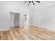 Light and airy bedroom with vaulted ceilings, a ceiling fan, and wood flooring at 1040 Southern High School Rd, Burlington, NC 27215
