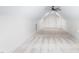 Bright bonus room features vaulted ceilings, neutral carpeting, and access to attic storage at 1040 Southern High School Rd, Burlington, NC 27215