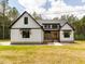 Charming new construction home with modern farmhouse design and beautiful curb appeal at 1040 Southern High School Rd, Burlington, NC 27215