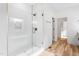 Modern bathroom glass shower with subway tile surround and gold fixtures at 1040 Southern High School Rd, Burlington, NC 27215