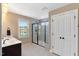 Bathroom with double vanity and large shower at 105 Virginia Creek Dr, Holly Springs, NC 27540