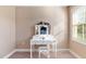 White vanity with tri-fold mirror and drawers at 105 Virginia Creek Dr, Holly Springs, NC 27540