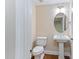 Elegant powder room with pedestal sink at 10510 Sablewood Dr # 110, Raleigh, NC 27617