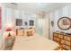 Cozy bedroom with striped walls, a patterned rug, and classic furniture at 110 E Orange St, Hillsborough, NC 27278