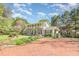 Inviting two-story home with manicured front yard and brick-paved driveway at 110 E Orange St, Hillsborough, NC 27278