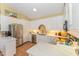 Bright kitchen featuring stainless steel appliances and sleek countertops at 110 E Orange St, Hillsborough, NC 27278