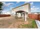 Backyard features a patio with a pergola, privacy fence and a garden with greenhouse at 112 Smith Rock Dr, Holly Springs, NC 27540