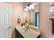 A half bath is conveniently located on the main floor and features updated vanity at 112 Smith Rock Dr, Holly Springs, NC 27540