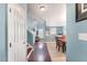 Inviting foyer with hardwood floors leads to the dining room at 112 Smith Rock Dr, Holly Springs, NC 27540