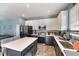Modern kitchen with stainless steel appliances and island at 112 Smith Rock Dr, Holly Springs, NC 27540