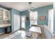 Cozy eat-in kitchen featuring a breakfast nook with booth seating and stainless steel appliances at 112 Smith Rock Dr, Holly Springs, NC 27540