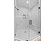 Walk-in shower with marble tile and built-in seat at 124 Sequoia Dr, Louisburg, NC 27549