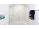 Clean bathroom with a shower/tub combo and tiled walls at 1309 Hudson Ave # D11, Durham, NC 27705