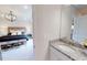 Simple bathroom with a single vanity and granite countertop at 1404 Hollyview Ave, Durham, NC 27703