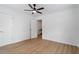Bright bedroom with hardwood floors and ceiling fan at 1606 James St, Durham, NC 27707