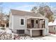 Gray house with a wooden front porch and stairs at 1606 James St, Durham, NC 27707