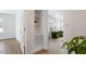 Bright hallway with access to living room and other rooms at 1606 James St, Durham, NC 27707