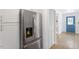 Stainless steel refrigerator with water dispenser in updated kitchen at 1606 James St, Durham, NC 27707