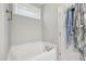 Relaxing bathroom with soaking tub and window at 165 Turlington Rd, Dunn, NC 28334