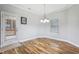 Bright dining area with hardwood floors and access to the back patio at 165 Turlington Rd, Dunn, NC 28334