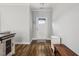 Bright entryway with hardwood floors and a bench at 165 Turlington Rd, Dunn, NC 28334