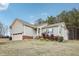 House exterior showcasing landscaping and driveway at 165 Turlington Rd, Dunn, NC 28334
