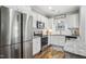 Well-equipped kitchen featuring white shaker cabinets and granite countertops at 165 Turlington Rd, Dunn, NC 28334