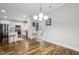 Kitchen boasts granite countertops, white cabinets, and stainless steel appliances at 165 Turlington Rd, Dunn, NC 28334