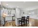 Open concept kitchen with island, granite counters & stainless steel appliances at 165 Turlington Rd, Dunn, NC 28334