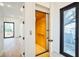 Modern home elevator with wood interior and glass doors at 2119 Brewer St, Raleigh, NC 27608