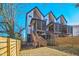 Modern three-unit building with screened porches and private backyard at 2119 Brewer St, Raleigh, NC 27608