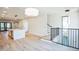 Open living space with hardwood floors and modern staircase at 2119 Brewer St, Raleigh, NC 27608