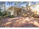 Brick patio with a covered porch and landscaping at 2201 Knollwood Dr, Sanford, NC 27330