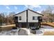Modern two-unit building with dark gray accents and attached garages at 2201 Millbank Village Ct # 101, Raleigh, NC 27610