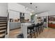 Open concept kitchen with island seating and stainless steel appliances at 2201 Millbank Village Ct # 101, Raleigh, NC 27610