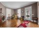 Living room with hardwood floors and antique furniture at 228 S Fayetteville St, Liberty, NC 27298