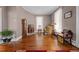 Warm and inviting living room with hardwood floors and vintage furnishings at 228 S Fayetteville St, Liberty, NC 27298