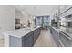 Modern kitchen with stainless steel appliances and an island at 3106 Kempthorne Rd # 47, Cary, NC 27519