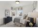 Charming bedroom with window seat and decorative pillows at 3110 Kempthorne Rd # 45, Cary, NC 27519