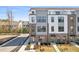 Three-story townhome, featuring gray and white exterior at 3110 Kempthorne Rd # 45, Cary, NC 27519