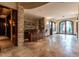 Stylish bar area with stone accents, offering a perfect spot for entertaining guests and enjoying refreshments at 32602 Archdale, Chapel Hill, NC 27517