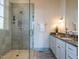 Modern bathroom featuring a glass-enclosed shower, granite countertop, and stylish fixtures at 32602 Archdale, Chapel Hill, NC 27517