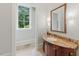 Elegant powder room with marble countertop and decorative lighting at 32602 Archdale, Chapel Hill, NC 27517