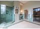 Bright bathroom features tile shower, pedestal sink, and large window, creating an open space at 32602 Archdale, Chapel Hill, NC 27517