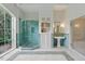 Light filled bathroom featuring glass shower, pedestal sink, tiled details and bright light at 32602 Archdale, Chapel Hill, NC 27517