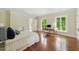 Bright bedroom featuring hardwood floors and a large desk area with lots of natural light at 32602 Archdale, Chapel Hill, NC 27517