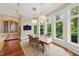 Elegant dining room bathed in natural light, offering a perfect setting for gatherings at 32602 Archdale, Chapel Hill, NC 27517