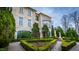 Luxurious home features detailed architecture, lush greenery and a beautiful garden at 32602 Archdale, Chapel Hill, NC 27517